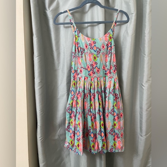 dELiA*s Dresses & Skirts - dELiA*s Aqua Neo Tribal Ska Asymmetrical Pattern Flare Dress with Pockets NWT